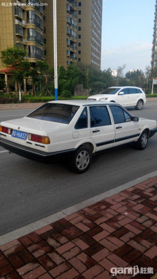 【出售山东二手白色桑塔纳】_14年行驶